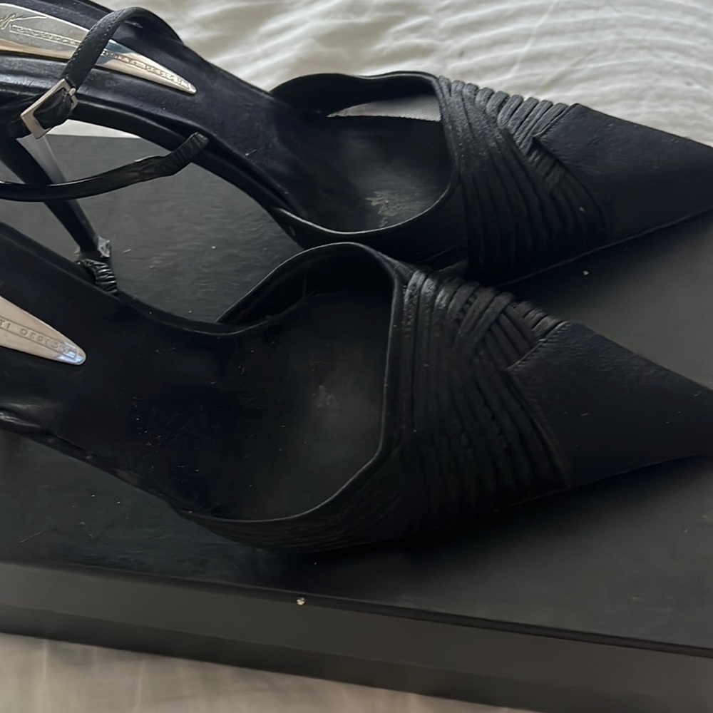 Ladies silk designer evening shoes

Heel needs repair